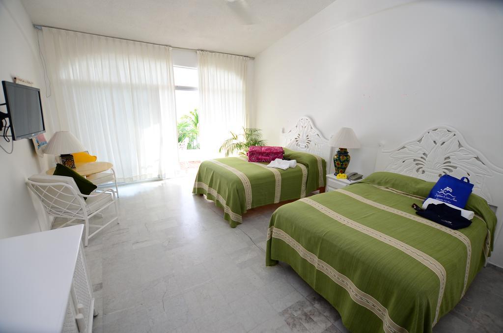 Dolphin Cove Inn Manzanillo Extérieur photo